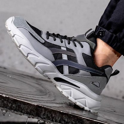 Chaussures de sécurité à semelle résistante à la pénétration gris