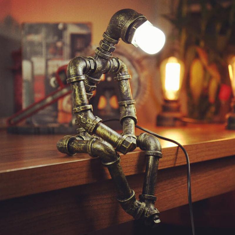 Lampe de table design robot en fer